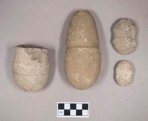 Ground stone, pecked and ground stone, grooved stones and grooved stone fragment, some with incised lines, some pounding stones, some unidentified