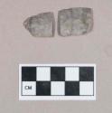 Chipped stone, scraper fragments; two fragments crossmend