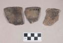 Ceramic, earthenware rim sherds, incised rim, cord-impressed body, shell-tempered; earthenware body sherd, punctate, shell-tempered; two rim sherds crossmend