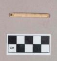 Worked animal bone object, perforated at one end, second partial perforation, possible ornament