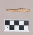 Worked animal bone object fragment, cylindrical, one end flattened and notched