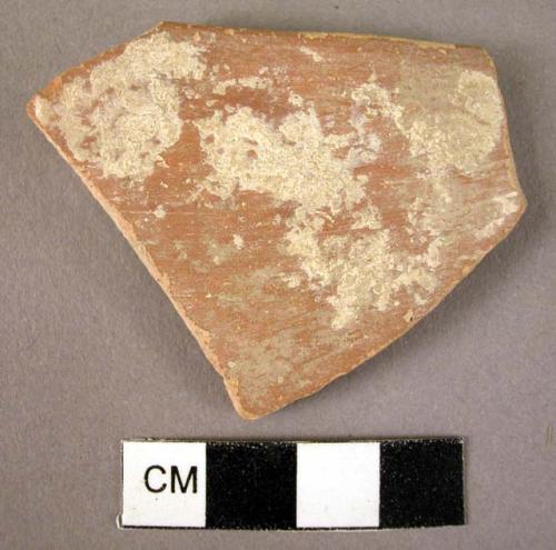 Apparently pottery sauceboat fragment - red "Urfirnis" glaze on handmade rim