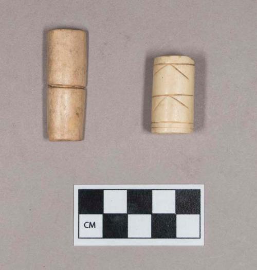 Worked animal bone tube and possible tube fragment, incised, polished