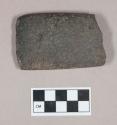 Ground stone, pecked and ground stone adze fragment