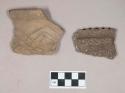 Ceramic, earthenware rim sherd, incised with possible Ramie design, shell-tempered; earthenware rim and handle sherd, missing handle, incised rim, shell-tempered