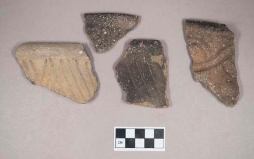 Ceramic, earthenware rim sherds, some incised, one with possible Ramie design, one punctate, shell-tempered