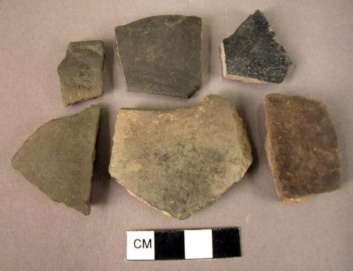 3 rim potsherds, 6 sherds - black burnished ware (Wace & Thompson, 1912, Type A5