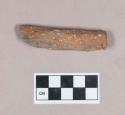 Ceramic, earthenware cylindrical object fragment, flattened on one end, possible handle, undecorated, shell-tempered