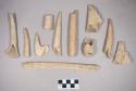 Cut and worked antler tine fragments, some with incised lines; worked antler cylindrical objects, paritally perforated; cut and worked antler fragments, one with gnawing marks; cut and worked antler object fragment, flat, sharpened at one end