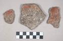 Ceramic earthenware, body sherds, shell tempered, undecorated, ochre on interior