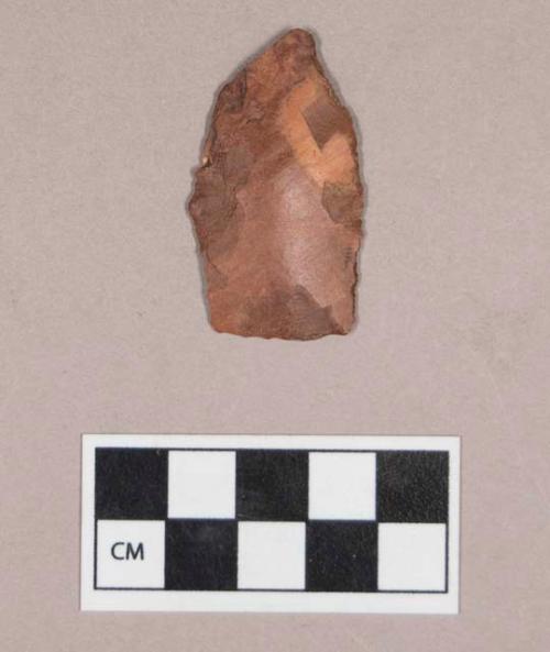 Chipped stone, bifacially worked, possible projectile point, possible catlinite