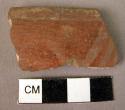 Rim potsherd - white on red (Wace & Thompson, 1912, Type A3# or B3#)