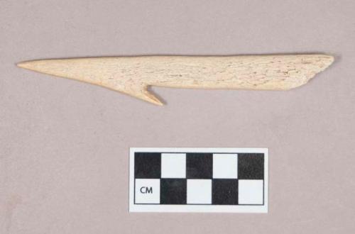 Worked antler, barbed point fragment, possible harpoon