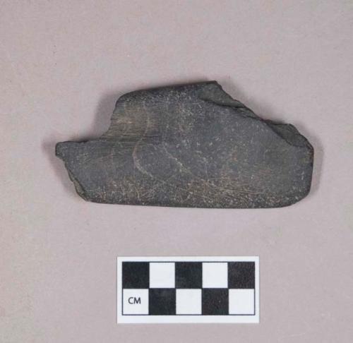 Ground stone, rectangular stone fragment, grooved and incised