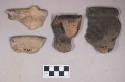 Ceramic, earthenware rim and handle sherds, one with incised rim, two with molded rim, one incised, two undecorated, one incised and cord-impressed, shell-tempered
