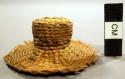 Miniature hat, basketry, woven grass