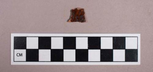 Ceramic, earthenware, red glazed redware body sherd