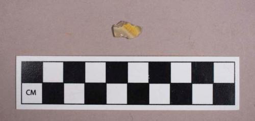 Ceramic, refined earthenware, yellow annular painted whiteware body sherd