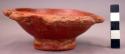 Small pottery bowl - ring base; lug handles around rim; red burnished;
