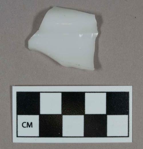 Glass, curved, milk glass, fragment