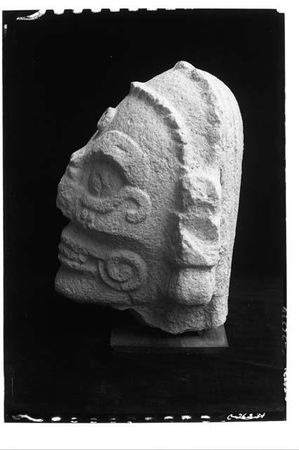 Temple of Little Heads; Stone head, side view