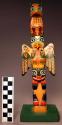 Miniature totem pole (11 1/2" high), thunderbird-eagle-wolf
