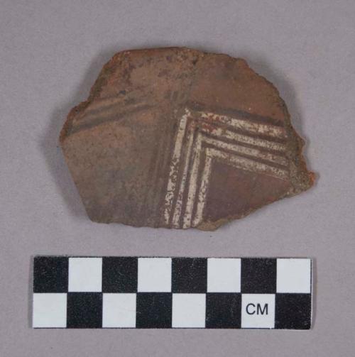 Ceramic rim sherd with polychrome designs