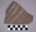 Ceramic body sherd with polychrome designs, mended