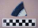 Ceramic, porcelain, English/French(?), blue and white decoration, rim sherd