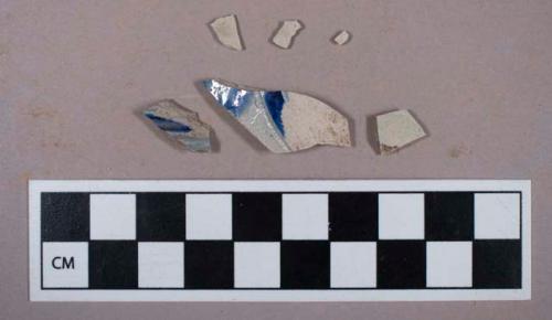 Ceramic, stoneware, grey bodied, salt glazed, incised and molded cobalt decorations, body sherds