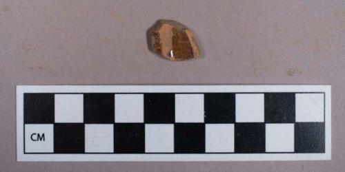 Ceramic, redware, brown lead glaze, body sherd