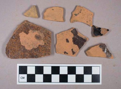 Ceramic, redware, brown and black lead glaze, body sherds