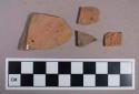 Ceramic, redware, black and brown lead glaze, body sherds