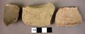 Rim potsherd, 2 sherds, 1 fragment of lug, 1 base fragment - red on white slip (