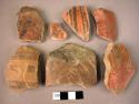 6 rim potsherds, 17 sherds, 1 rim sherd with lug, 2 rim sherds with perforated l