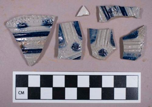 Ceramic, stoneware, grey bodied, grey salt glaze, cobalt incised decorations, body sherds with possible refits; Ceramic, stoneware, white salt glaze, incised decoration, body sherd