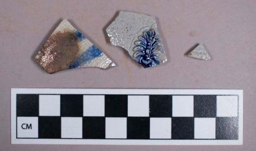 Ceramic, stoneware, grey bodied, Westerwald-type, sprig molded cobalt decoration, body sherds; Ceramic, stoneware, grey bodied, American Westerwald-type, cobalt decoration, ferrous staining, body sherd