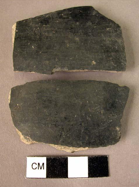 2 rim potsherds, 1 base fragment, 9 potsherds, 1 shoulder sherd - black polished