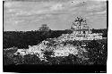 Caracol, view from Monjas before repair of tower and SW corner of lower platform