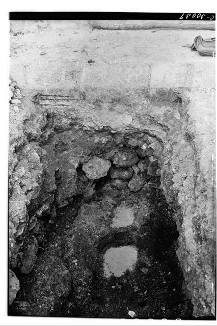 Caracol. Pit at base of stairway showing fill and floor levels.