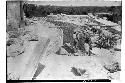 Masons facing the pit which exposes 1929 circular structure. Caracol.