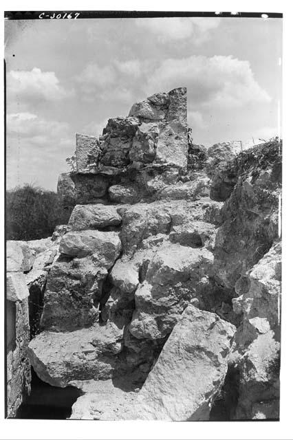 Caracol. Showing construction of cornice and parapet of lower platform.