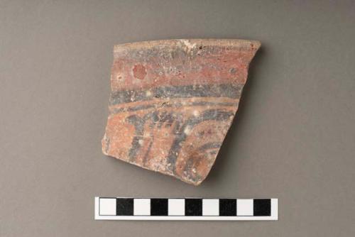 Coarse sherds, mostly slipped orange or red.  Some polychrome; rims and bases.