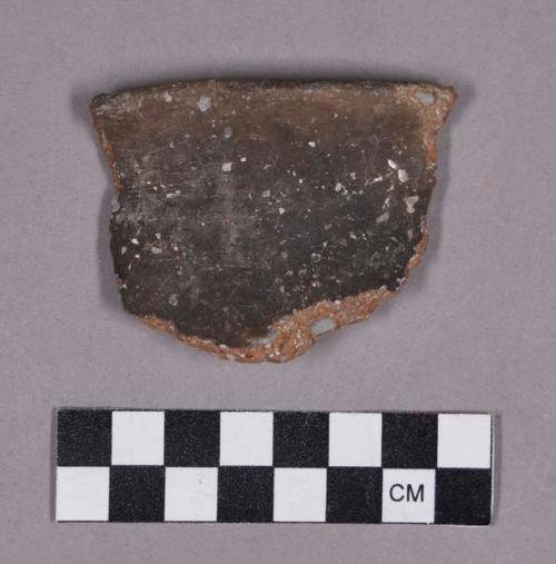 Ceramic, earthenware rim sherd, shell-tempered, undecorated