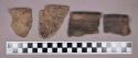 Ceramic, earthenware rim and body sherds, shell-tempered, cord-impressed and undecorated