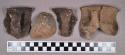 Ceramic, earthenware rim sherds, shell-tempered, strap handles, cord-impressed, punctate, and undecorated, notched rims; one mended sherd
