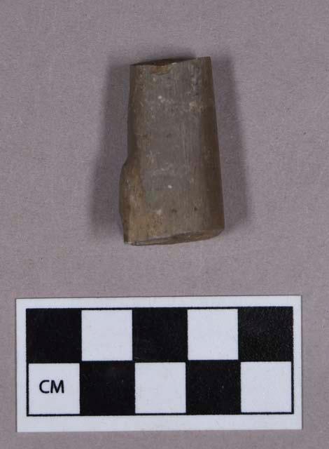 Ground stone, fragment, partially drilled