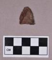 Chipped stone, projectile point, triangular, some cortex visible