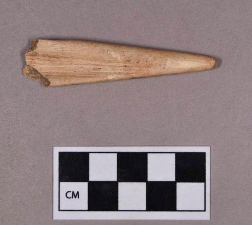 Organic, utilized antler, tapered fragment