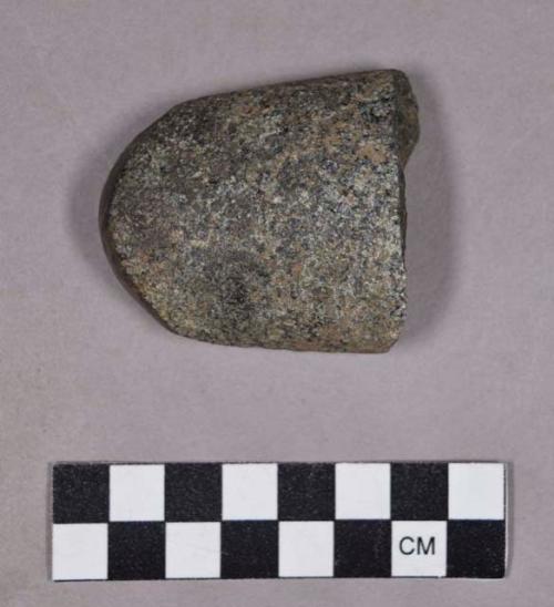 Ground stone fragment, possible base of tool